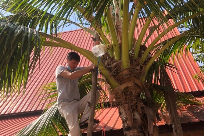 Amphawa Boat Ride & Railway Market: Multi-Lang Private Tour - Wat Bang Kung and the banyan-wrapped hall