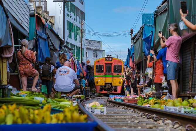Amphawa Floating Market & Maeklong Railway Train Market Tour - Wat Bang Kung and the temple wrapped in trees