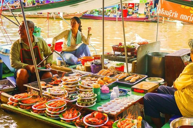 Amphawa Floating Market Tour with Maeklong Railway Market (SHA Plus) - Maeklong Railway Market and the train crossing
