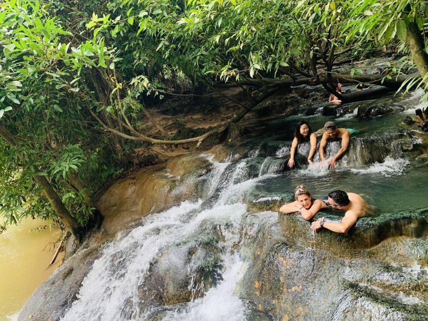 Ao Nang: Hot Spring, Emerald Pool & Tiger Cave Temple Tour - Walking the rainforest trail to Emerald Pool