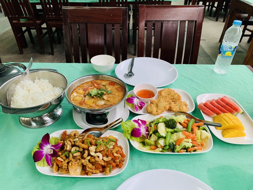 Ao Nang: Hot Spring, Emerald Pool & Tiger Cave Temple Tour - Warm water at the hot spring waterfall