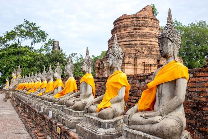 Ayutthaya Sunset Tour: Iconic Temples & Scenic River Boat Ride - Wat Mahathat and the famous Buddha head