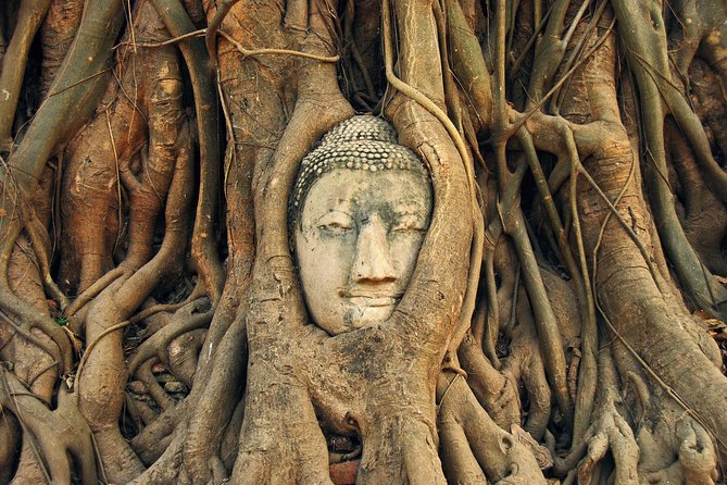 Ayutthaya Sunset Tour: UNESCO Temples & Peaceful River Cruise - Wat Mahathat and Ayutthaya’s tree-root Buddha