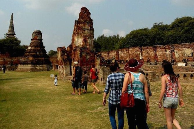 Ayutthaya UNESCO Temples Group Tour with Lunch - Wat Mahathat and the Buddha head in the roots