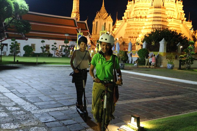 Bangkok at Night by Electric Scooter - Wat Arun and the Chao Phraya ferry