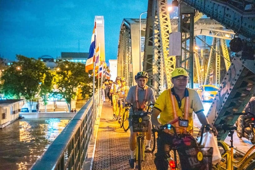 Bangkok by Night Cycling Tour with Street-food Meal - Chinatown under lanterns and shop signs