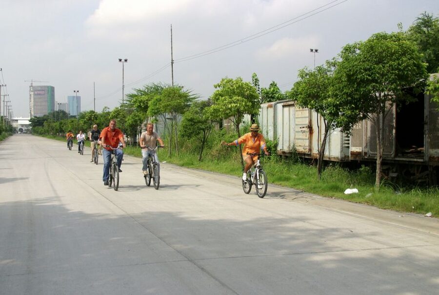 Bangkok: City Culture half-day Bike Tour - Pedaling beside the train graveyard