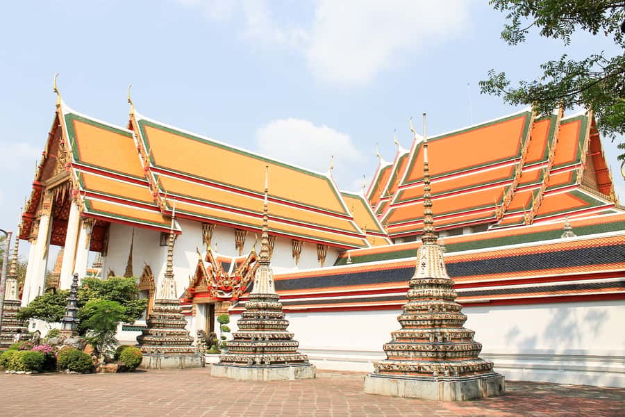 Bangkok: City Highlights Temple and Market Walking Tour - Walking toward Wat Pho and Tha Thien Market