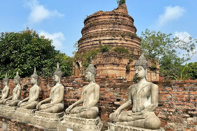 Bangkok Classic 3-Temples With Buffet Lunch Day Tour - A river lunch that may change