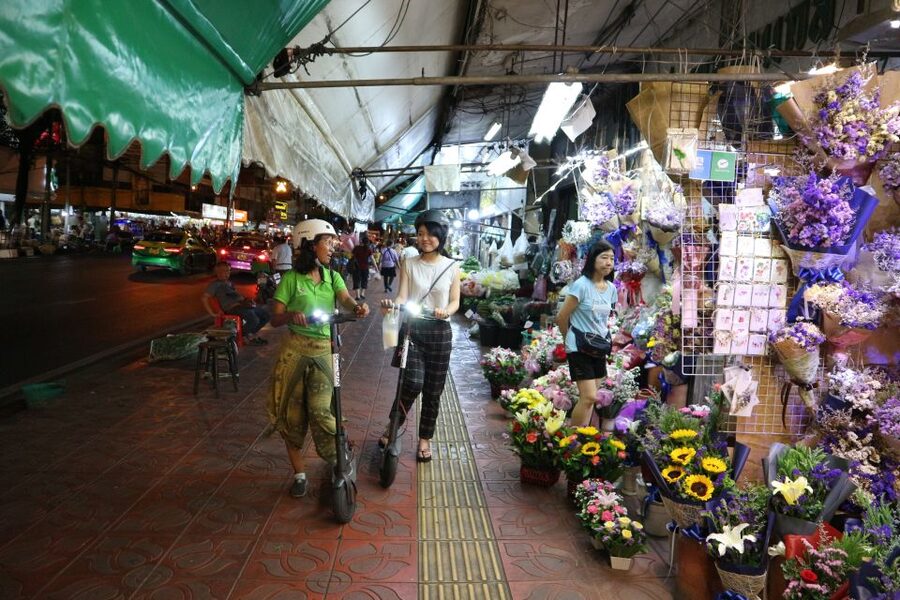 Bangkok: E-Scooter Night Tour with Local Street Food - Crossing the Chao Phraya by local ferry