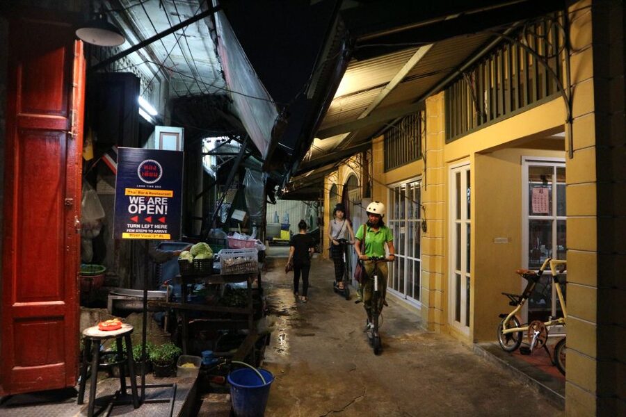 Bangkok: E-Scooter Night Tour with Local Street Food - Wat Pho and the Grand Palace after dark