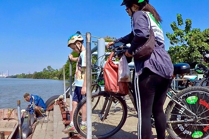 Bangkok Green Oasis 4-Hour Bike Tour with Boat Ride - Riding Bang Krachao’s raised paths and back lanes