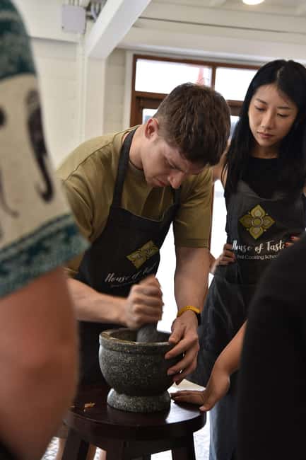 Bangkok: Hands-on Thai Cooking Class & Market Tour in Sathon - Four dishes, eaten one at a time
