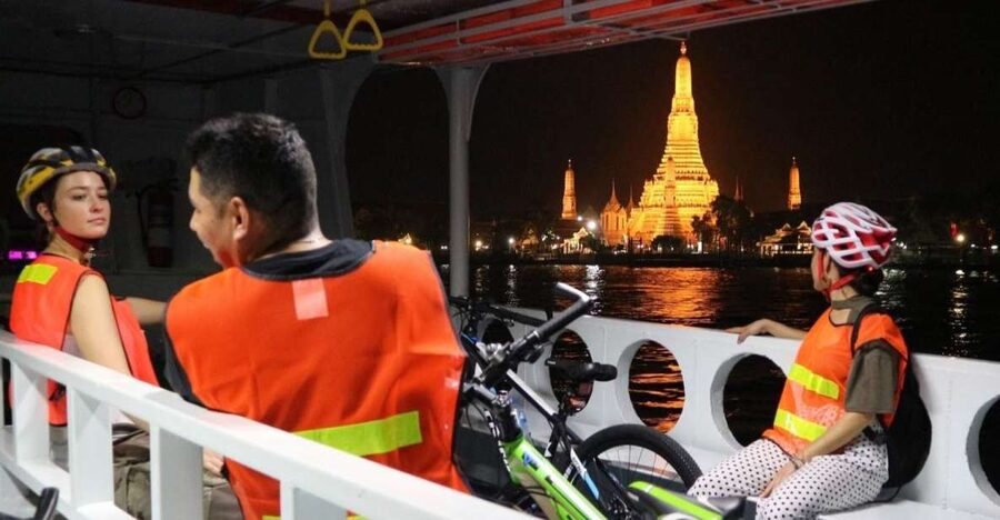 Bangkok: Night Bike Ride and Dinner at a Local Restaurant - Wat Arun from the Thonburi riverbank