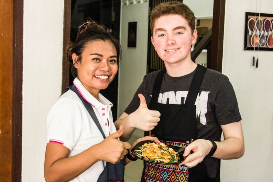 Bangkok: Thai Cooking Class and Onnuch Market Tour - Sitting down to eat what you cooked