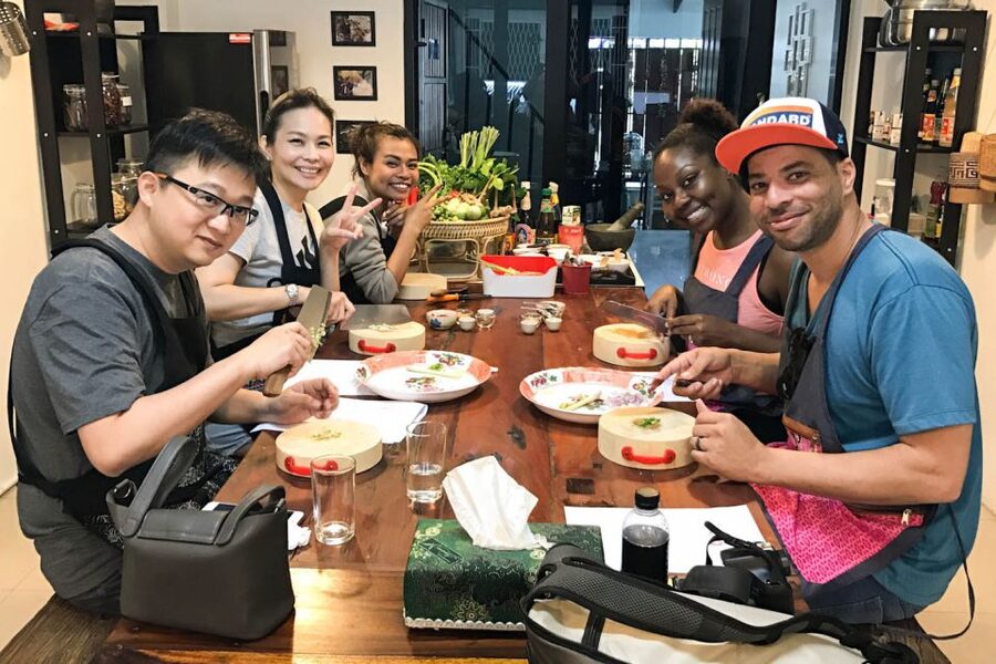 Bangkok: Thai Cooking Class and Onnuch Market Tour - Choosing ingredients at Onnuch Market