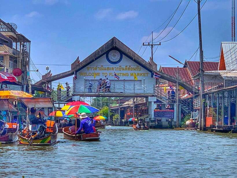 Bangkok: Train Market & Floating Market with Boat Ride - Watching Maeklong Railway Market close around the tracks