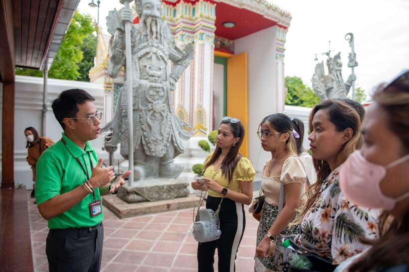 Bangkok: Wat Pho and Wat Arun Guided Walking Tour - Coconut water, walking, and the practical rhythm