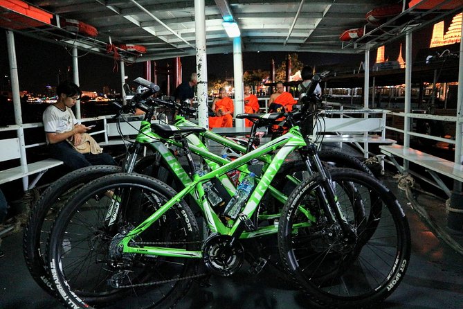 Bike Bangkok at Night with Thai Dinner - Back streets, old warehouses, and Wat Prayoon