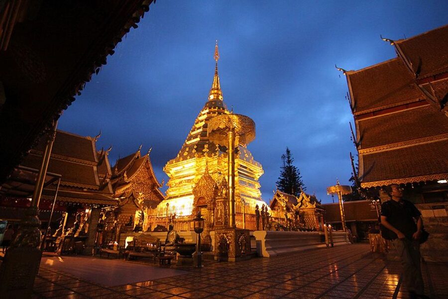 Chiang Mai: Doi Suthep & Wat Umong Twilight Tour with Pickup - Doi Suthep: gold, Naga steps, and Chiang Mai below