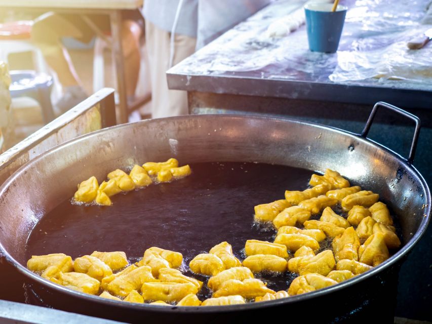 Chiang Mai: Local Food and Markets Guided Walking Tour - Warorot Market turns the walk into a food lesson