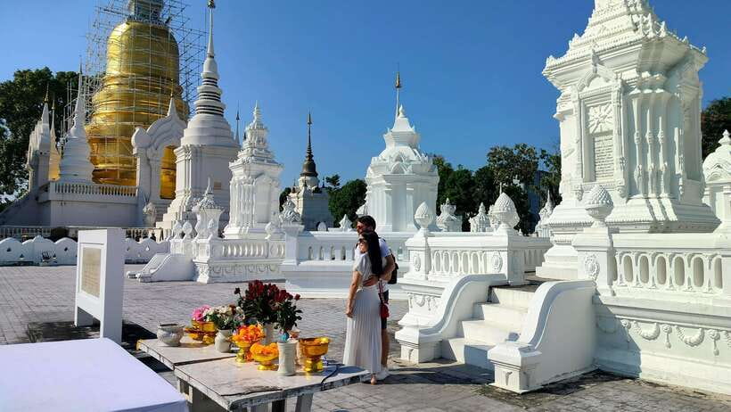 Chiang Mai: Tuk-Tuk Evening Tour with Temples & Street Foods - Wat Suan Dok and its field of white chedis