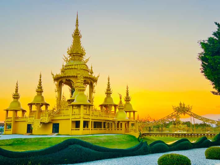 Chiang Rai: Discover 7 Must-See Spots & Lunch Included - Wat Rong Suea Ten brings a strong blue contrast
