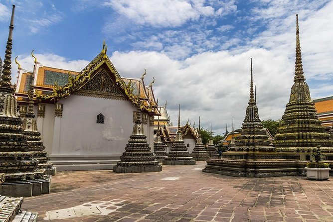 Cultural Treasures of Bangkok: Temples & Royal Palace Tour - Included costs and possible extras