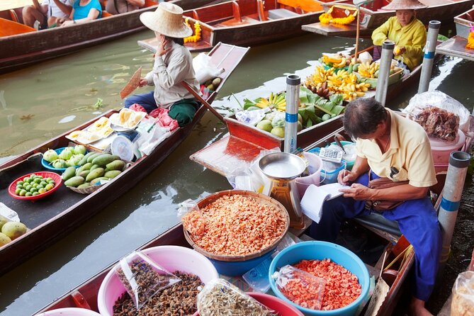 Damnoen Saduak Floating Market and Maeklong Railway Market Tour - Damnoen Saduak and its canal-side trade