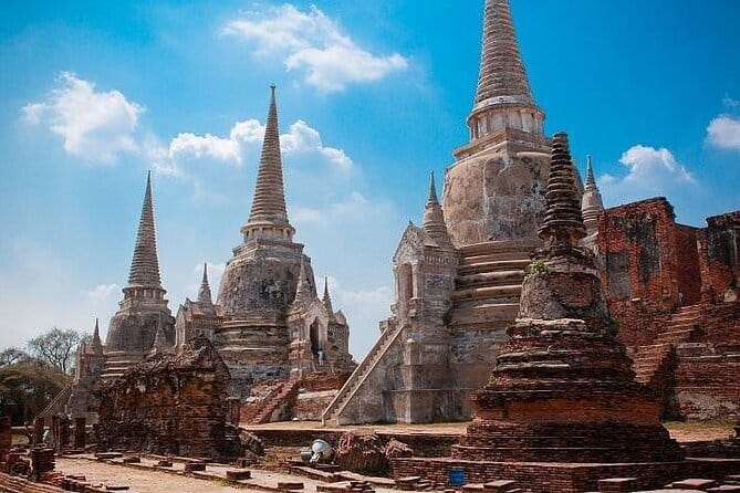 Damnoen Saduak Floating Market & Railway Market Tour from Bangkok - Weather, cancellation, and small practical points