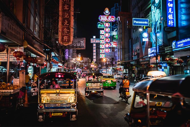 Discover Bangkok at Night 5-Hour Bike Tour with dinner - A Chao Phraya ferry ride with the bikes