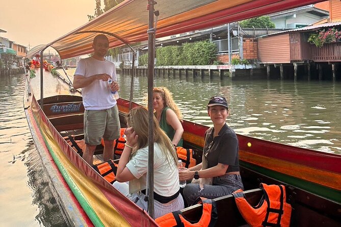 Discover Hidden Bangkok with Longtail Boat Tour - The Big Buddha of Wat Paknam from the canal
