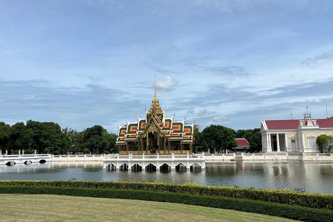 Explore Ancient Ayutthaya Historical Park Day Tour in Bangkok - Wat Yai Chaimongkul closes with a tall chedi and reclining Buddha