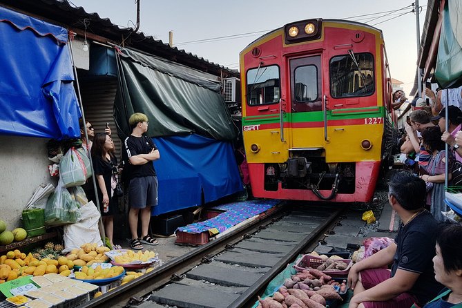Floating Market Damnoen Saduak and Meklong Railway Market: Half Day Tour - What the $120.81 price really covers