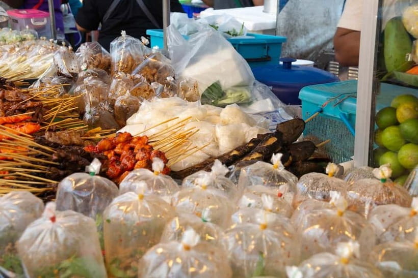 From Bangkok: Don Wai Market, Wat Samphran & Lotus Café Tour - Pickup, timing, and the Bangkok return