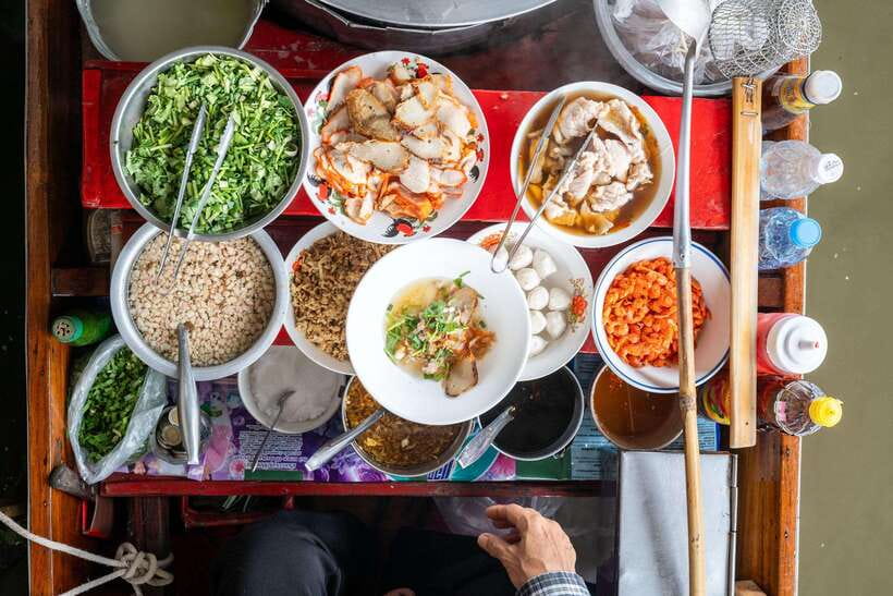 From Bangkok: Railway & Damnoen Saduak Floating Market Tour - A family home making palm sugar