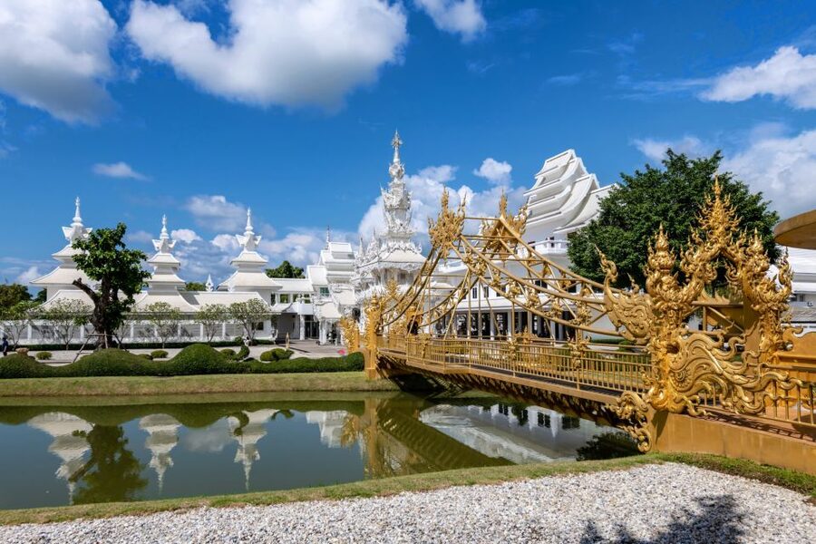 From Chiang Mai: Chiang Rai's Temples Exploration Day Trip - The Red Temple and its spiritual stories