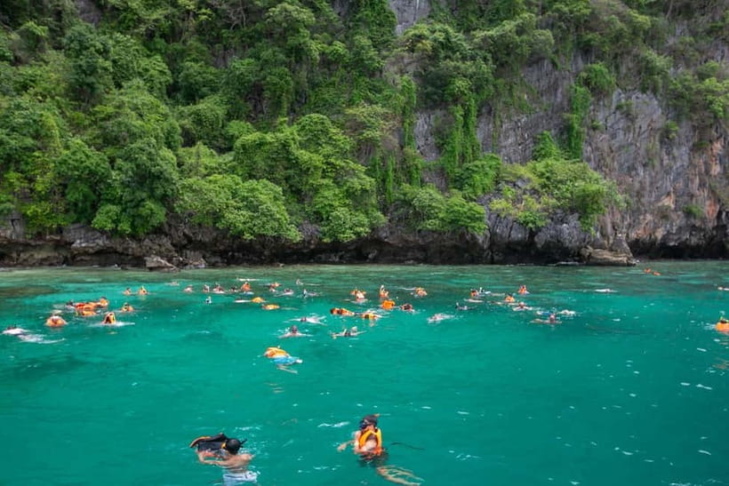 From Phi Phi : Splash & Explore – Half-Day Tour By longtail - Viking Cave, drawings, and a quick cultural pause