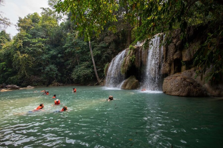 Kanchanaburi: Erawan Waterfall & Train Full-Day Tour - Erawan National Park and its seven tiers