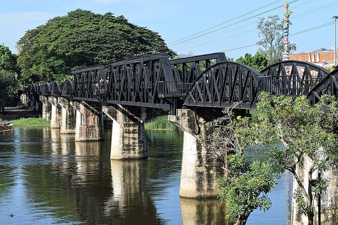 Kanchanaburi Full Day Tour: River Kwai and Erawan Falls - Reaching the bridge by boat
