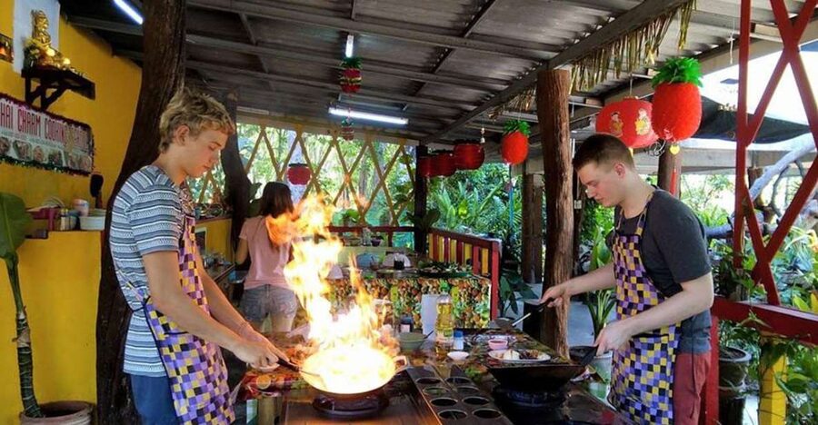 Krabi: Cooking Class at Thai Charm Cooking School with Meal - Rice, soup, noodles, and salads in one busy class