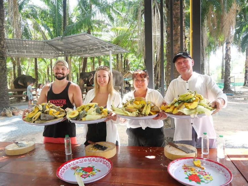 Krabi: Elephant Feeding Program with Food Preparation - Hand-feeding and reading each elephant’s personality
