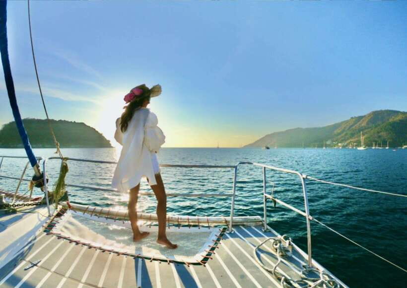 Phuket: Coral Island Catamaran Cruise with Sunset Dinner - Coral Island beach time, swimming, and paid activities