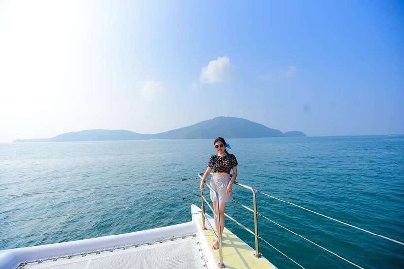 Phuket: Coral Yacht Boat Tour to Coral Island with Sunset - Pirates Beach and the first swim
