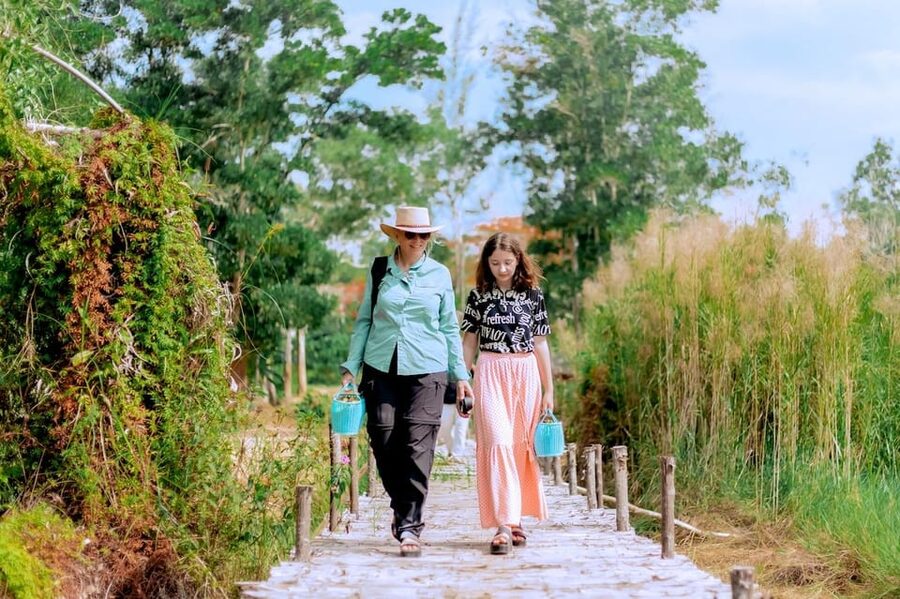 Phuket: Elephant Sanctuary Feed and Bathe Gentle Giants - Following the elephants to the nearby river