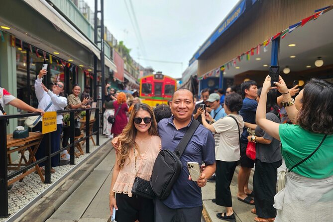 Private Floating Market, Train Market and After Rain Cafe Tour - The train that cuts through Maeklong Market