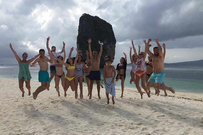 Railay and 4-Island Sunset Speedboat Cruise with Night Snorkel - Railay’s cliffs and Phra Nang Cave Beach