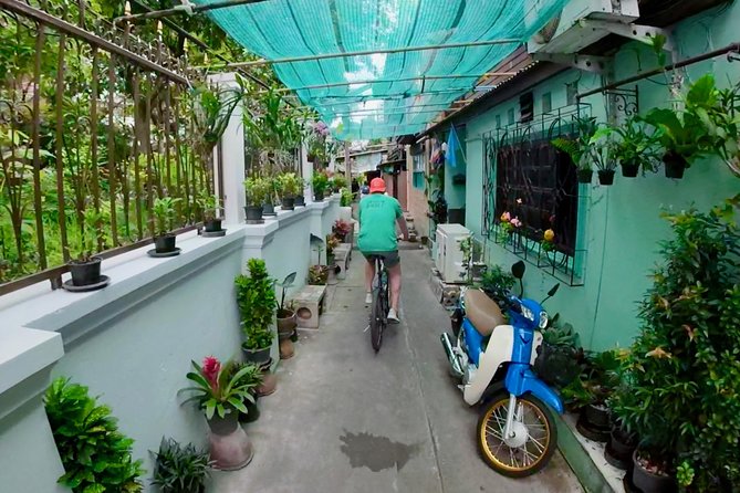 Thai Culture and Local Life 4- Hour Bangkok Bike Tour - Crossing the Chao Phraya River
